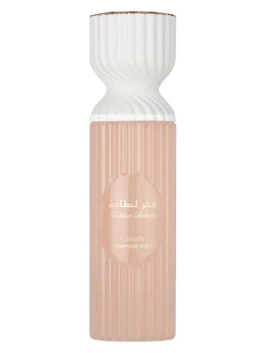 Lattafa Fakhar Lattafa Mist body mist bottle, a warm fragrance